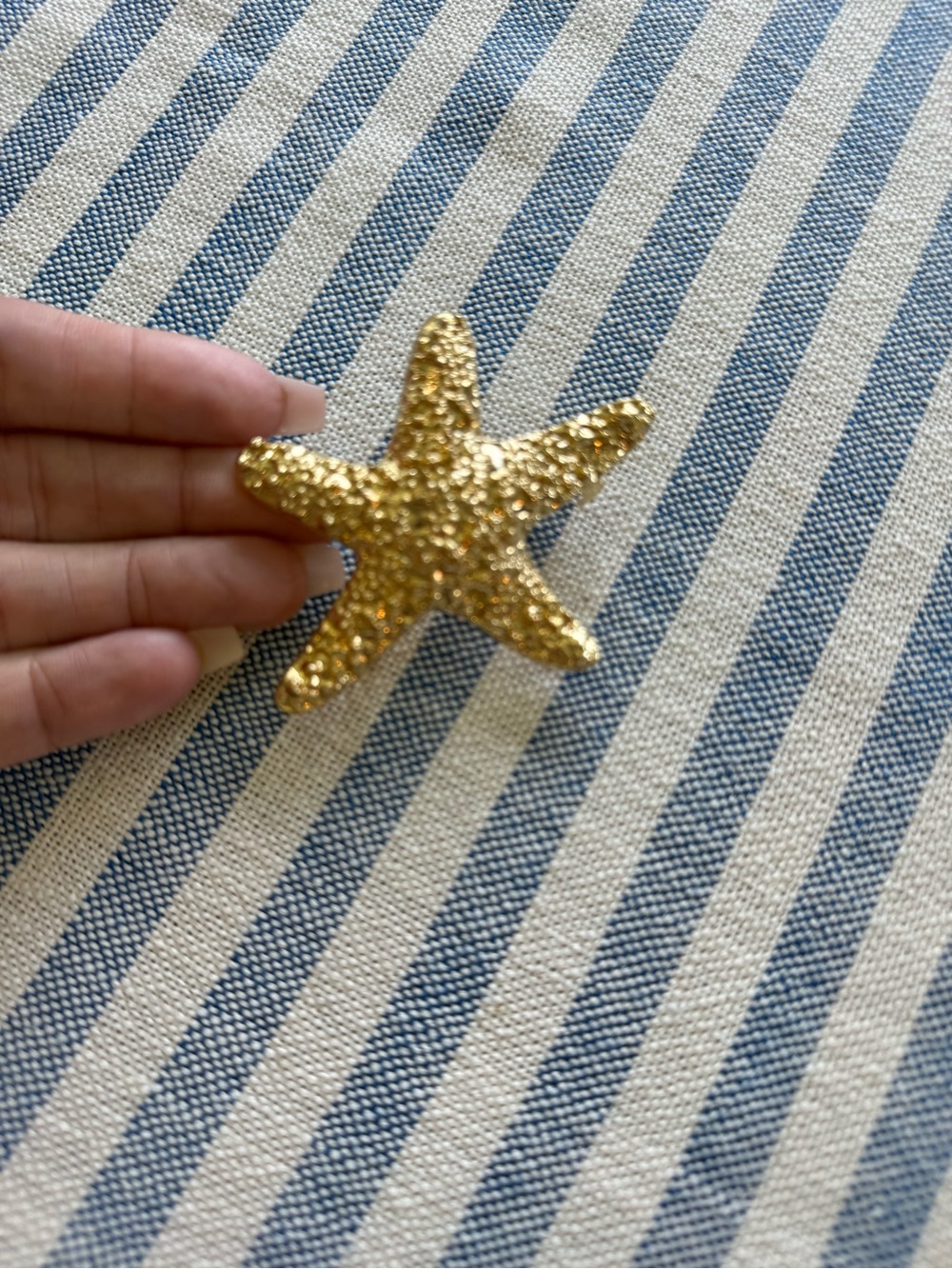 Gold starfish hair clip